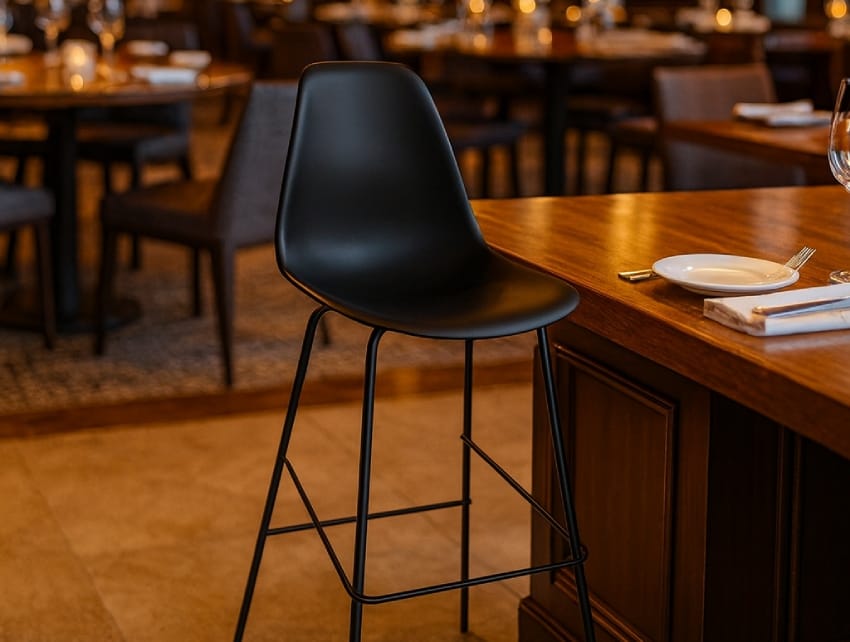 Black plastic bar stool at a restaurant