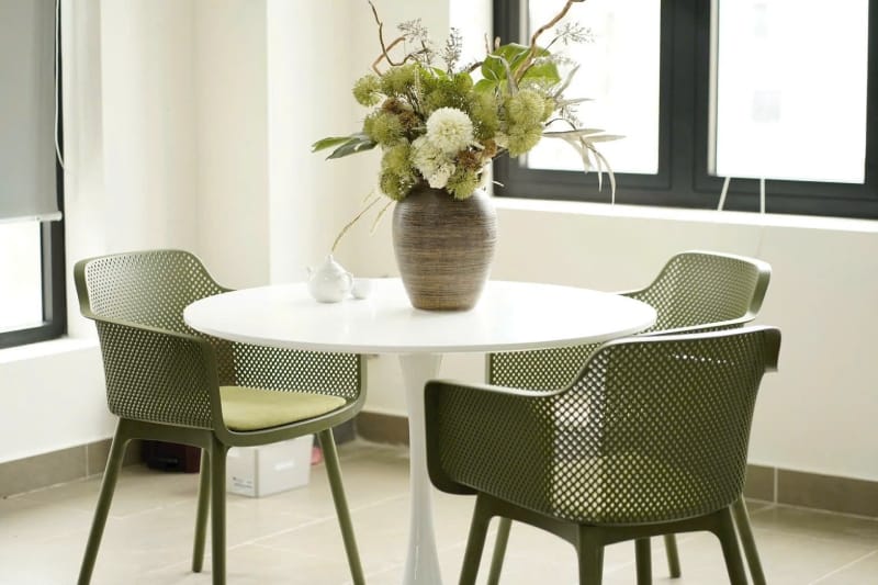 Plastic dining chair with a soft seat cushion