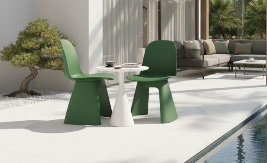 Plastic dining chairs in oasis space
