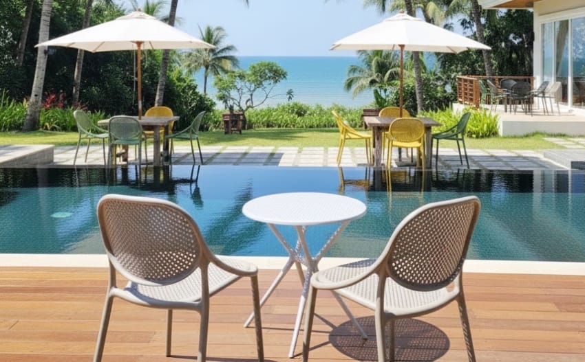 Other plastic garden chairs in the swimming pool area
