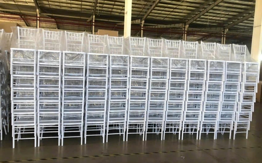 White plastic stackable chairs in stock